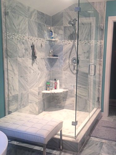 shower design remodel gray tile with glass enclosure