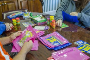 Some of our staff hard at work to make 30 kits for kids