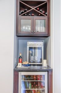 Custom wine bar installed in place of a small closet