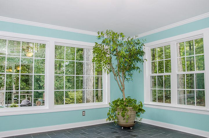 two-story home addition with sunroom