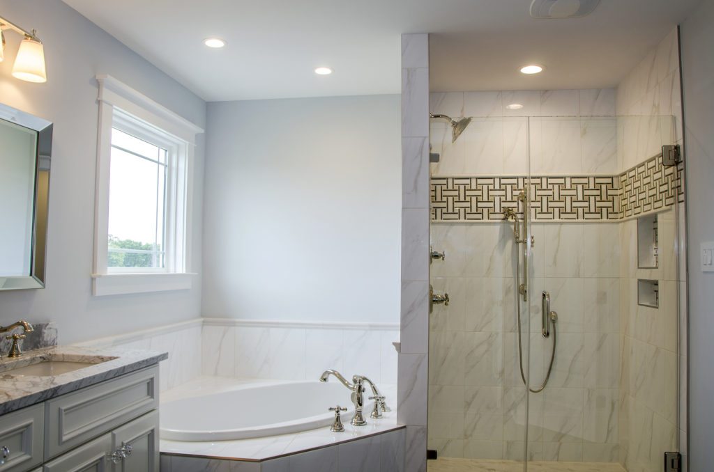 classic master bathroom with white granite