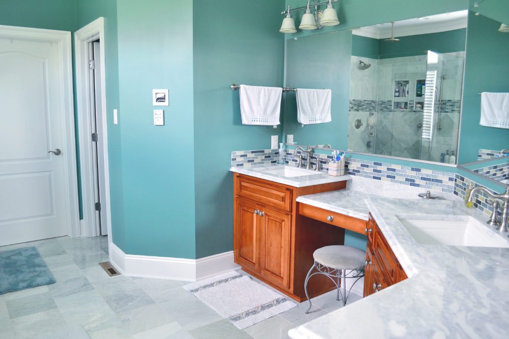 bathroom remodel with turquoise walls